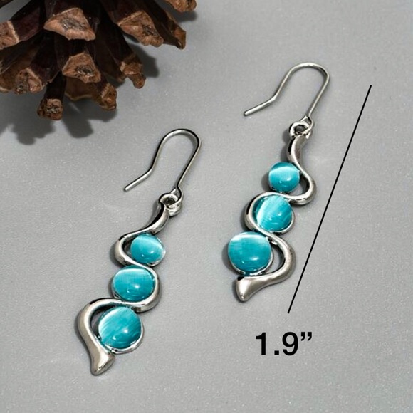 Any 4/$25! Silver Baby Blue Crystal Drop Earrings - Picture 4 of 6
